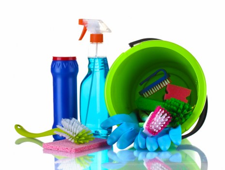 House cleaning essentials in a bright modern home